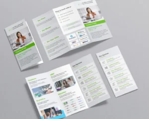 Brochures dépliées présentant le profil d’une entreprise, sa vision, ses valeurs, ses services informatiques et ses contacts, avec des images d’équipe et une mise en page professionnelle.